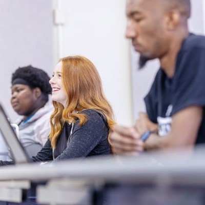 Students are smiling and attentive in class