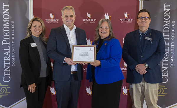 From left: Amanda James, associate VP at Winthrop; Winthrop President Edward Serna; Central Piedmont Chief Academic Officer Heather Hill; and Central Piedmont Dean Stacy Moore