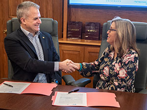 Winthrop President Edward Serna, left, and Post and Courier President PJ Browning 