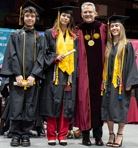 President's Award winners, from left, Will Elliot, Sera Crookes, President Edward Serna `02, and Erin Dinlocker.